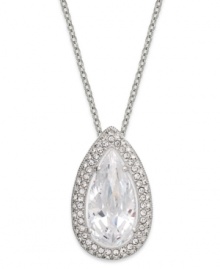 Sophistication reigns with this pave-framed pendant necklace from Eliot Danori. Crafted from rhodium-plated brass, a clear cubic zirconia (5 ct. t.w.) makes a bold statement. Approximate length: 16 inches + 2-inch extender. Approximate drop: 7/8 inch.