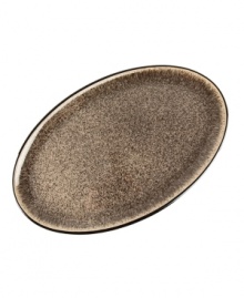 More than meets the eye, Denby's Praline oval platter boasts standout durability in addition to style, carrying your main course hot from the oven and onto your table. With a distinct silhouette in casual stoneware and unique speckled glaze. More than meets the eye, Denby's Praline oval platter boasts standout durability in addition to style, carrying your main course hot from the oven and onto your table. With a distinct silhouette in casual stoneware and unique speckled glaze.