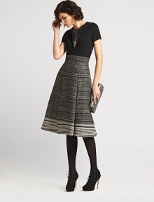 Finespun knit wool, embellished with a sparkling panel of sequins.Jewel necklineShort sleevesSequined insetBack keyhole button closureWoolDry cleanMade in ItalyModel shown is 5'10½ (177cm) wearing US size Small. Finespun knit wool, embellished with a sparkling panel of sequins.Jewel necklineShort sleevesSequined insetBack keyhole button closureWoolDry cleanMade in ItalyModel shown is 5'10½ (177cm) wearing US size Small.