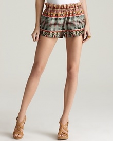 Take your look to new heights with Rebecca Minkoff tribal-print shorts. Playful and on-trend, the luxurious style goes from day-ready to evening-perfect with a swap of shoes and an armful of bangles. Take your look to new heights with Rebecca Minkoff tribal-print shorts. Playful and on-trend, the luxurious style goes from day-ready to evening-perfect with a swap of shoes and an armful of bangles.