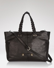 Crafted of leather, this SONIA RYKIEL tote fuses a Left Bank vibe with modern ease. Carry it for practicality with an air of Parisian charm. Crafted of leather, this SONIA RYKIEL tote fuses a Left Bank vibe with modern ease. Carry it for practicality with an air of Parisian charm.