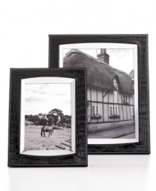 Show everyone your wild side. With silver trim and white stitching, the Faux Croc picture frame lends a touch of the exotic to your home gallery. From Leeber. Show everyone your wild side. With silver trim and white stitching, the Faux Croc picture frame lends a touch of the exotic to your home gallery. From Leeber.