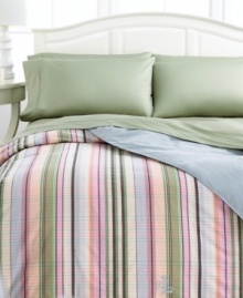 Show off your softer side with the incredibly cozy Martha's Vineyard down-alternative comforter from Lauren Ralph Lauren. This plush comforter boasts a pattern of preppy stripes on one side and soothing blue solid on the other, accented with an embroidered Lauren Ralph Lauren monogram at the base. Finished with stitched edges. Show off your softer side with the incredibly cozy Martha's Vineyard down-alternative comforter from Lauren Ralph Lauren. This plush comforter boasts a pattern of preppy stripes on one side and soothing blue solid on the other, accented with an embroidered Lauren Ralph Lauren monogram at the base. Finished with stitched edges.