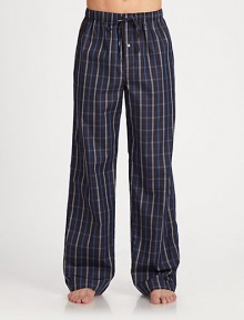 Woven pant features classic styling and modern, eye-catching check pattern.Elastic drawstring waistInseam, about 32CottonMachine washImported