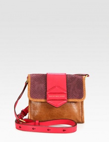 A modern and chic style in supple leather accented with python embossed suede in a fun colorblock design.Adjustable leather shoulder strap, 16½-20 dropMagnetic snap flap closureOne inside zip pocketTwo inside open pocketsFully lined8W X 7H X 2DImported
