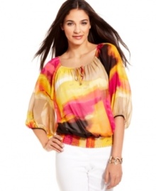 The beauty of the summer sunrise inspired this floaty peasant top from Alfani. Pair it with crisp white pants to give your look a spirited pop of color.