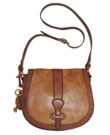 Grab hold of great style with this vintage-inspired flap bag from Fossil. A saddle silhouette, goldtone hardware and a signature key charm add the perfect finishing touches to this unique design. Grab hold of great style with this vintage-inspired flap bag from Fossil. A saddle silhouette, goldtone hardware and a signature key charm add the perfect finishing touches to this unique design.