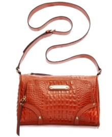 Create a commotion with this sleek, croc-embossed design from Franco Sarto. Ultra-soft leather is accented with signature golden hardware, while the pocket-lined interior easily stashes your daytime essentials. Create a commotion with this sleek, croc-embossed design from Franco Sarto. Ultra-soft leather is accented with signature golden hardware, while the pocket-lined interior easily stashes your daytime essentials.