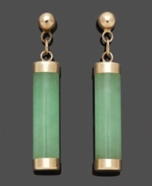 Whether for an elegant evening affair or to add simple color to a casual outfit, these polished green drops are the perfect finishing touch. Solid jade cylinders (4 mm x 15 mm) add subtle color in a 14k gold post setting. Approximate drop: 1/2 inch.