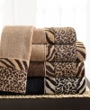 Transform the bath into a mini safari. The Cheshire hand towel is woven from smooth cotton and has a dramatic band of sheared velour zebra and cheetah prints.