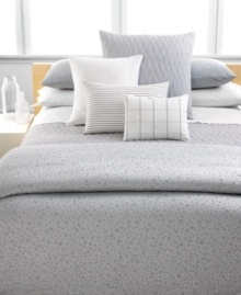 In classic Calvin style, this Mykonos Pewter quilt features luxe allover quilting in a sleek wave pattern for rich texture. The lightweight cotton fabric makes it perfect for layering into your bed.