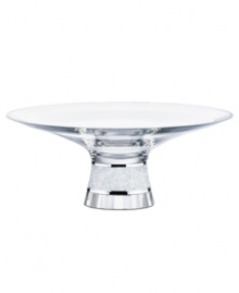 Made of pure Swarovski crystal, the Crystalline bowl has a broad rim and shallow surface, making it the ultimate pedestal for chocolates, fruit or floating candles. A fully faceted base and stem of chatons provide a lifetime of mesmerizing sparkle.