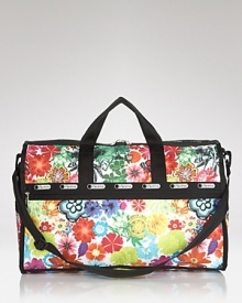 LeSportsac's signature nylon duffel is ready for travels, featuring a durable design, plenty of pockets and a cute print. It's totally ready for takeoff. LeSportsac's signature nylon duffel is ready for travels, featuring a durable design, plenty of pockets and a cute print. It's totally ready for takeoff.