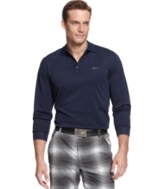 Get your swing on. PlayDry® technology gives you classic comfort so you can keep your eye on the ball in this Greg Norman performance golf shirt. Get your swing on. PlayDry® technology gives you classic comfort so you can keep your eye on the ball in this Greg Norman performance golf shirt.