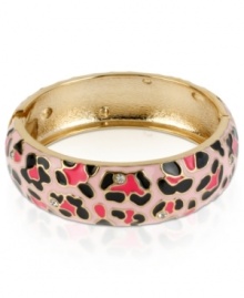 Heed the call of the wild with this hinged bangle bracelet from Betsey Johnson. Crafted from gold-tone mixed metal, a leopard print and glass crystal accents give this an edgy fashion infusion. Approximate diameter: 2-3/8 inches. Heed the call of the wild with this hinged bangle bracelet from Betsey Johnson. Crafted from gold-tone mixed metal, a leopard print and glass crystal accents give this an edgy fashion infusion. Approximate diameter: 2-3/8 inches.