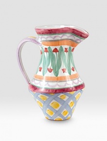A handcrafted ceramic design inspired by a trip to a Dutch tulip market is individually painted by master ceramics artisans in an array blossoms and bold lines. For an especially one-of-a kind touch, each piece bears the hand-placed stamps of the artisans who created it. Dishwasher- and microwave-safe Six-ounce capacity 10H X 6¼ diam. Made in USA A handcrafted ceramic design inspired by a trip to a Dutch tulip market is individually painted by master ceramics artisans in an array blossoms and bold lines. For an especially one-of-a kind touch, each piece bears the hand-placed stamps of the artisans who created it. Dishwasher- and microwave-safe Six-ounce capacity 10H X 6¼ diam. Made in USA