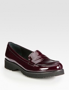 Classic patent penny loafer style. Rubber heel, 1¼ (30mm)Rubber platform, ½ (15mm)Compares to a ¾ heel (20mm)Patent leather upperLeather liningRubber trek solePadded insoleImported