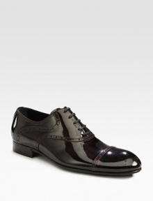 Classicly modern, designed in shiny leather with a cap toe and wingtip perforations.Leather liningLeather soleMade in Italy Classicly modern, designed in shiny leather with a cap toe and wingtip perforations.Leather liningLeather soleMade in Italy