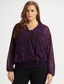 An exquisite print meets ethereal fabrication to create a breezy top with a feminine self-tie detail. Its smocked hem ensures this top offers a flattering and comfortable fit.Tie detail at v-neckDolman sleevesElasticized cuffsAllover printSmocked hemAbout 28 from shoulder to hemPolyesterMachine washImported