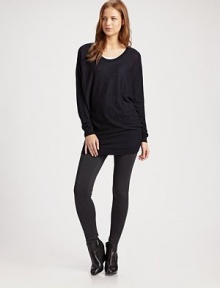 Slouchy scoopneck with long dolman sleeves hits below the hips, concluding with an alluring v-back. Ribbed scoopneckLong dolman sleevesRibbed cuffs and hemV-back40% rayon/30% nylon/25% polyester/5% cashmereDry cleanImported