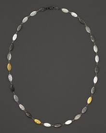 Gurhan's Willow necklace blends white silver, dark silver and 24 Kt. yellow gold in hammered leaf shapes to create a flowing, textured complement to your everyday attire.