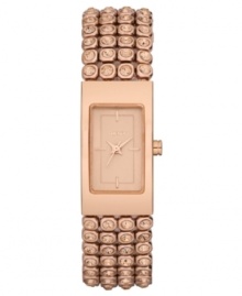 Embrace the rosy sparkle on this ladylike timepiece from the always chic DKNY.