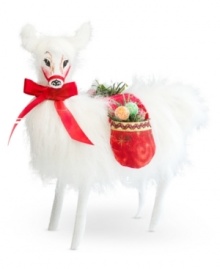 Sweet on Christmas, this snow-white llama has saddlebags stuffed with sugary treats. With the soft, flexible features and distinct charm of Annalee figurines.