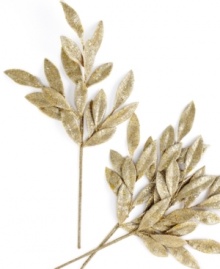 Brilliant gold sparkles glam up your tree this holiday season in these spectacular Gold Leaf picks. Perfect for giving your tree a more full look. Brilliant gold sparkles glam up your tree this holiday season in these spectacular Gold Leaf picks. Perfect for giving your tree a more full look.