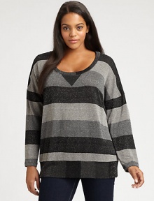 A glamorous take on an athletic style, this striped top is enhanced by pretty metallic thread. Its relaxed-yet-feminine silhouette will complement your shape.Round neckLong sleevesPull-on styleAbout 26 from shoulder to hemRayon/lurexMachine washMade in USA