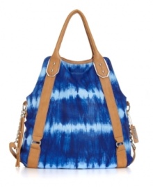 A unique bag with an alluring watercolor-inspired design. This spacious tote can carry all your essentials and more. Shiny nickel hardware and contrast trim perfectly accent this take-anywhere style. A unique bag with an alluring watercolor-inspired design. This spacious tote can carry all your essentials and more. Shiny nickel hardware and contrast trim perfectly accent this take-anywhere style.