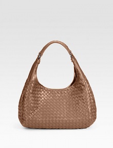 Soft and slouchy in woven leather with gunmetal hardware. Double shoulder straps, with 8 drop Inside buckle strap and hidden magnetic closure Inside pockets: One zip and one for your phone Suede lining 14½W X 8H X 4½D Made in Italy Soft and slouchy in woven leather with gunmetal hardware. Double shoulder straps, with 8 drop Inside buckle strap and hidden magnetic closure Inside pockets: One zip and one for your phone Suede lining 14½W X 8H X 4½D Made in Italy