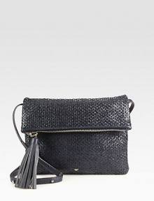 This beautiful textured, woven leather style features zippered pocket in the flap and a convenient detachable strap.Detachable adjustable shoulder strap, 13-23¾ dropFlap closure with zip compartmentLarge tassel zipper pullOne inside zip pocketOne inside open pocketCotton lining11¾W X 8½H X 1DImported This beautiful textured, woven leather style features zippered pocket in the flap and a convenient detachable strap.Detachable adjustable shoulder strap, 13-23¾ dropFlap closure with zip compartmentLarge tassel zipper pullOne inside zip pocketOne inside open pocketCotton lining11¾W X 8½H X 1DImported