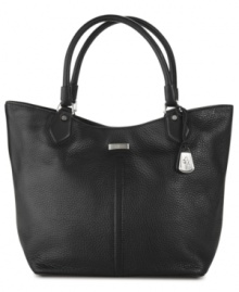 Whether you're off to the market or a martini bar, this versatile tote silhouette from Cole Haan will carry you there in style. Soft, pebble leather and luxurious custom hardware lend a perfectly posh look, while the practically organized interior provides pockets and compartments for all the essentials. Whether you're off to the market or a martini bar, this versatile tote silhouette from Cole Haan will carry you there in style. Soft, pebble leather and luxurious custom hardware lend a perfectly posh look, while the practically organized interior provides pockets and compartments for all the essentials.