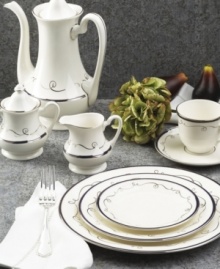 Set the table with charm and delight with the Infinity collection form Pickard. This graceful pattern features midnight blue bands framed by platinum and accented further by a whimsical, free-flowing, platinum ribbon. Round vegetable bowl not shown. Set the table with charm and delight with the Infinity collection form Pickard. This graceful pattern features midnight blue bands framed by platinum and accented further by a whimsical, free-flowing, platinum ribbon. Round vegetable bowl not shown.