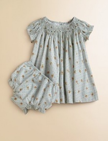 Tailored in airy woven cotton for a gently flowing silhouette, a short-sleeved floral-print dress is beautifully complemented with a smocked neckline and embroidered Swiss dots.Round smocked necklineShort puffed sleevesBack buttonsFull slip with scalloped edgingMatching bloomersCottonHand washImported Please note: Number of buttons may vary depending on size ordered. Tailored in airy woven cotton for a gently flowing silhouette, a short-sleeved floral-print dress is beautifully complemented with a smocked neckline and embroidered Swiss dots.Round smocked necklineShort puffed sleevesBack buttonsFull slip with scalloped edgingMatching bloomersCottonHand washImported Please note: Number of buttons may vary depending on size ordered.