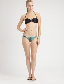 A seductive swim style with a pretty turquoise center. Bandeau topRemovable halter strapBack tie closure84% polyamide/16% elastaneFully linedHand washImported Please note: Bikini bottom sold separately. 