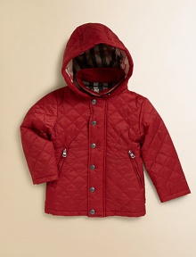 A quilted classic with detachable hood, check lining and zippered pockets in an A-line silhouette to help your mini-me brave the elements in style.Snap-off hoodShirt collarLong sleevesSnap-front with concealed zipperSide slash pockets with zippersNylonMachine washImported Please note: Number of snaps may vary depending on size ordered. 