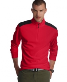 Step up your game with this performance-packed half-zip from Izod. Moisture wicking fabric keeps you dry plus UPF 30 shields against harmful ultra-violet rays so you stay in the zone. (Clearance) Step up your game with this performance-packed half-zip from Izod. Moisture wicking fabric keeps you dry plus UPF 30 shields against harmful ultra-violet rays so you stay in the zone. (Clearance)