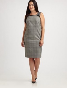 A sleek shift featuring a timeless plaid pattern and delicate lace details. This dress was designed to fit you flawlessly thanks to expert tailoring and a touch of stretch.Feminine necklineSleevelessPrincess seamsFrench dartsBack zipperBack ventFully linedAbout 26 from natural waist64% polyester/33% viscose/3% spandexDry cleanMade in Italy