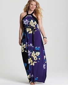 Graphic florals punctuate the floor-sweeping silhouette of this Tahari Woman Plus maxi dress. Slip the style under a leather jacket for a modern take on femininity.