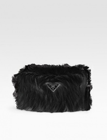 Lush faux fur makes this slim bag an instant statement-maker.Wristlet strap, 5½-6 drop Top zip closure Signature jacquard lining 11W X 7H X 3½D Made in Italy Lush faux fur makes this slim bag an instant statement-maker.Wristlet strap, 5½-6 drop Top zip closure Signature jacquard lining 11W X 7H X 3½D Made in Italy