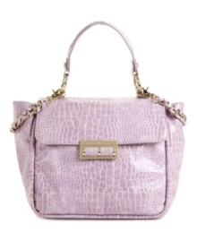 Eye-catching yet classic, this stunning croc embossed bag by Ivanka Trump features a glossy all-over croc skin print, polished goldtone hardware and a sophisticated flap design with an optional woven chain shoulder strap. Eye-catching yet classic, this stunning croc embossed bag by Ivanka Trump features a glossy all-over croc skin print, polished goldtone hardware and a sophisticated flap design with an optional woven chain shoulder strap.