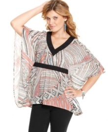 Jessica Simpson pairs a bold abstract print with poncho design on a top that adds optimal style to your day look! Jessica Simpson pairs a bold abstract print with poncho design on a top that adds optimal style to your day look!