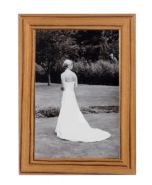 Made of wood but with a striated veneer that evokes the unmistakable marks of a zebra, this Tizo picture frame lends rustic, eye-catching allure to casual settings. Made of wood but with a striated veneer that evokes the unmistakable marks of a zebra, this Tizo picture frame lends rustic, eye-catching allure to casual settings.
