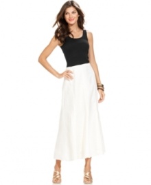 A full maxi silhouette rendered from breezy linen lends a beach-inspired touch to this Ellen Tracy skirt. A full maxi silhouette rendered from breezy linen lends a beach-inspired touch to this Ellen Tracy skirt.