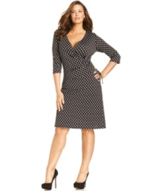 Look darling in dots with Elementz' three-quarter-sleeve plus size wrap dress!