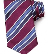 Not your average stripe design, this lavish silk tie is intricately detailed with deft variations on a classic width.
