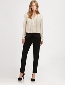 Delicate eyelet, gathered in an effortless pullover with beautiful satin trim.Reversed notch collarScarf tieLong sleevesButton cuffsShirttail hemShoulder yoke overlayAbout 25 from shoulder to hemRayonDry cleanImportedModel shown is 5'9 (175cm) wearing US size 4. Delicate eyelet, gathered in an effortless pullover with beautiful satin trim.Reversed notch collarScarf tieLong sleevesButton cuffsShirttail hemShoulder yoke overlayAbout 25 from shoulder to hemRayonDry cleanImportedModel shown is 5'9 (175cm) wearing US size 4.