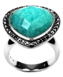 A touch of teal. Faceted Peruvian amazonite makes its presence known on this gorgeous cocktail ring by Judith Jack. Set in sterling silver with glittering marcasite edges. Size 7.