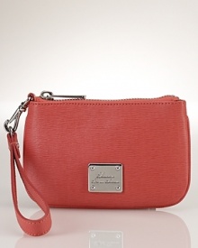 A perennially chic accessory with a practical edge, this top zip leather wristlet from Lauren Ralph Lauren is perfectly sized for the smallest essentials. A perennially chic accessory with a practical edge, this top zip leather wristlet from Lauren Ralph Lauren is perfectly sized for the smallest essentials.